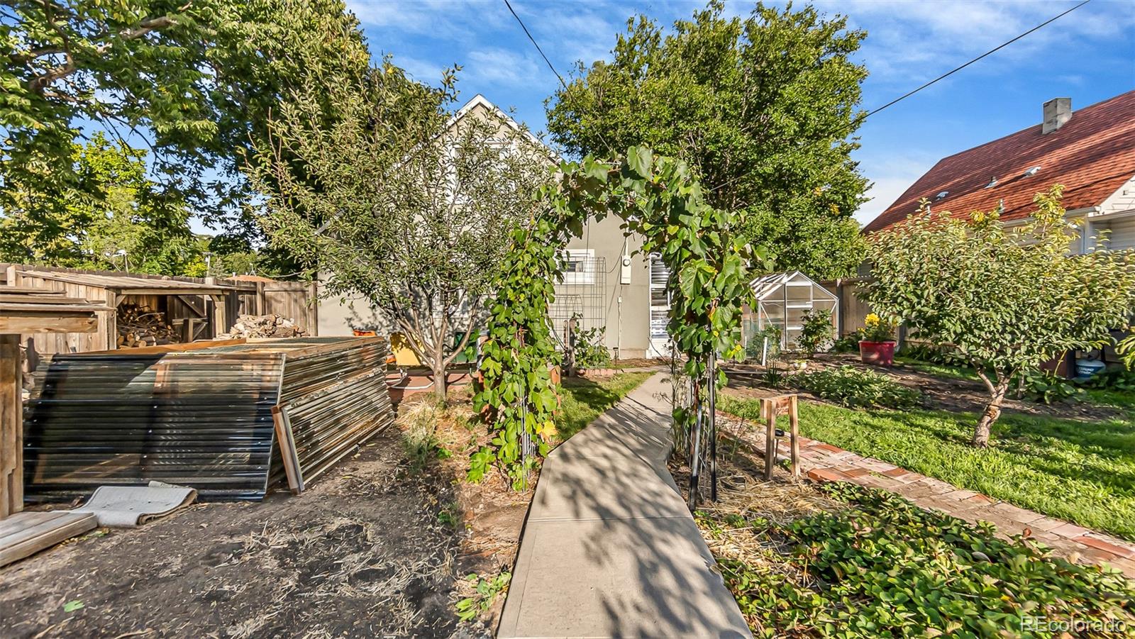 581 Bent Avenue Akron, CO 80720 - Photo 20 of 23 a view of a house with a yard