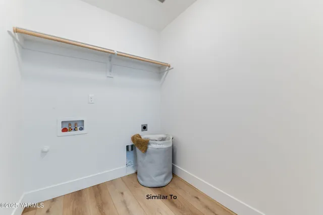 a picture of a bathroom with a sink