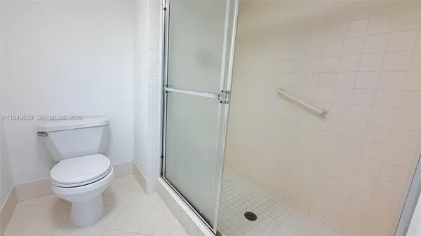a view of a bathroom with shower