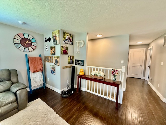 708 East North Street Monticello, IL 61856 - Photo 2 of 38 a view of livingroom with furniture and wooden floor