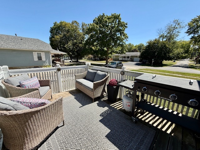 708 East North Street Monticello, IL 61856 - Photo 25 of 38 a view of roof deck with furniture