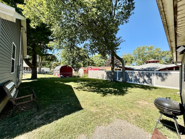 708 East North Street Monticello, IL 61856 - Photo 27 of 38 a front view of a house with a yard table and chairs