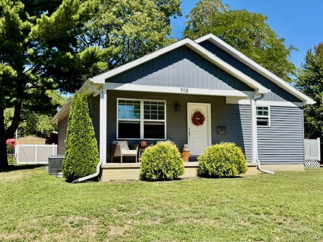 708 East North Street Monticello, IL 61856 - Photo 34 of 38 a house with a tree in front of it