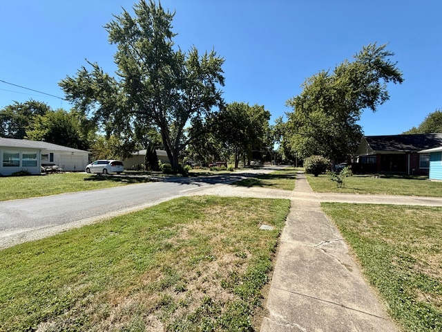 708 East North Street Monticello, IL 61856 - Photo 37 of 38 a swimming pool with outdoor seating and yard