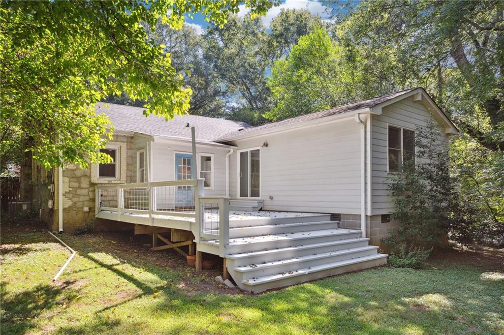 385 Sunset Drive Athens, GA 30606 - Photo 36 of 48 a front view of a house with a yard