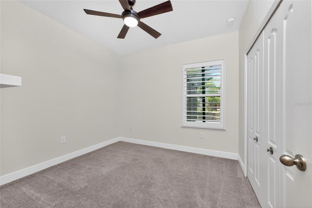 27366 Deep Creek Boulevard Punta Gorda, FL 33983 - Photo 30 of 63 a view of a room with a window and a fan