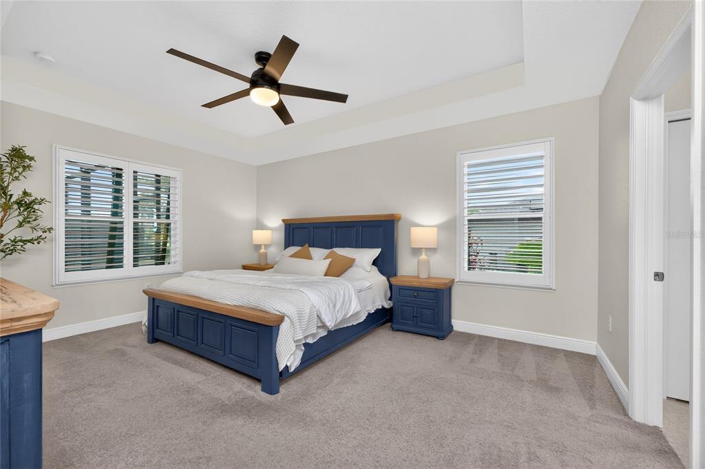27366 Deep Creek Boulevard Punta Gorda, FL 33983 - Photo 32 of 63 a spacious bedroom with a bed and window