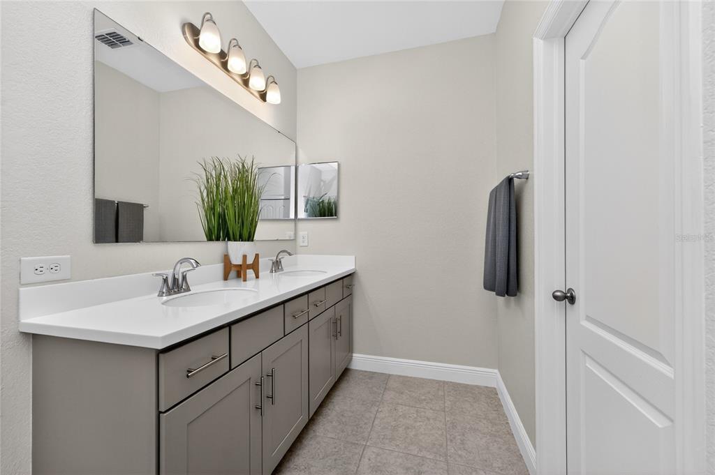 27366 Deep Creek Boulevard Punta Gorda, FL 33983 - Photo 36 of 63 a bathroom with a sink and a mirror