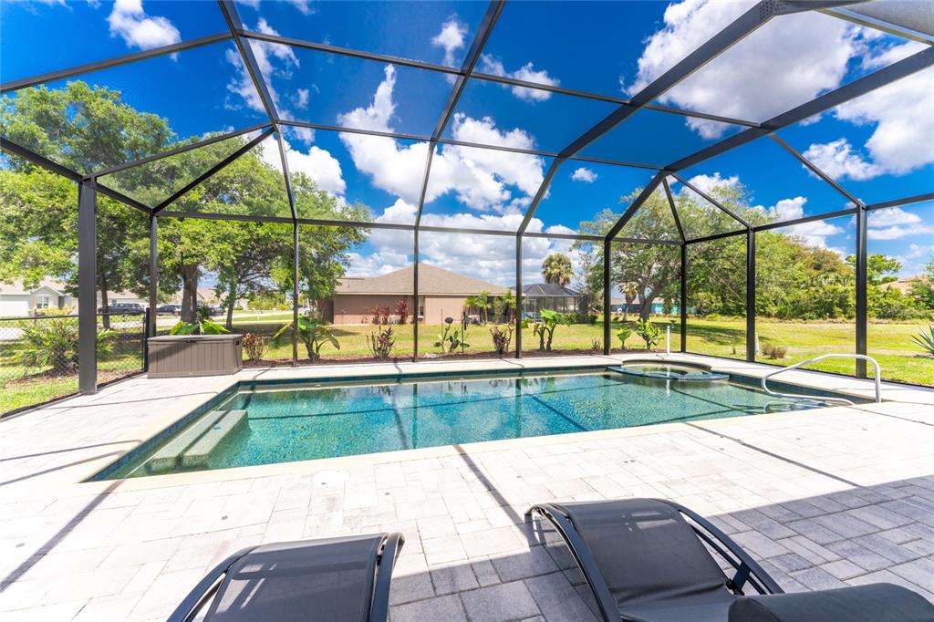 27366 Deep Creek Boulevard Punta Gorda, FL 33983 - Photo 43 of 63 a view of a swimming pool with a patio