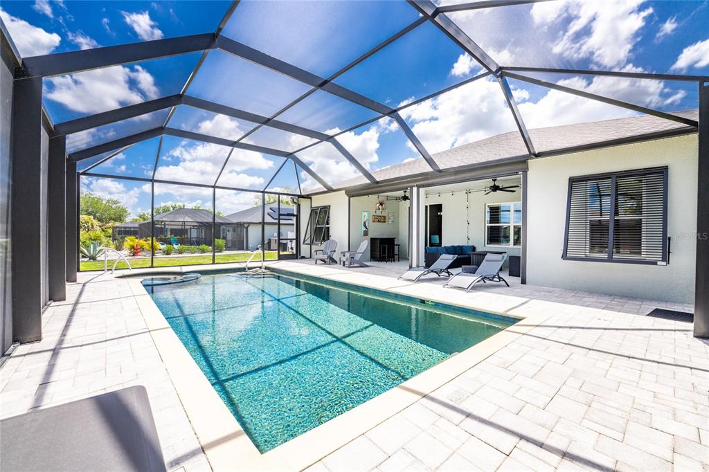 27366 Deep Creek Boulevard Punta Gorda, FL 33983 - Photo 45 of 63 a view of swimming pool with outdoor seating