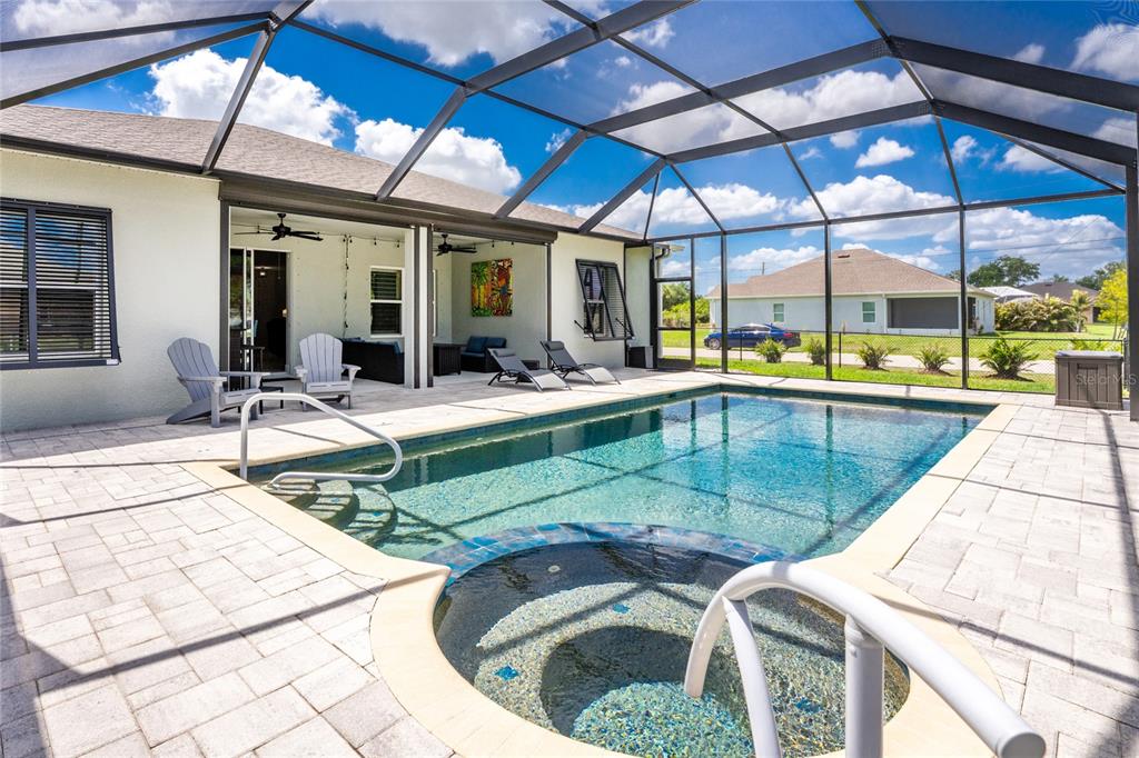 27366 Deep Creek Boulevard Punta Gorda, FL 33983 - Photo 47 of 63 a view of a backyard with sitting area