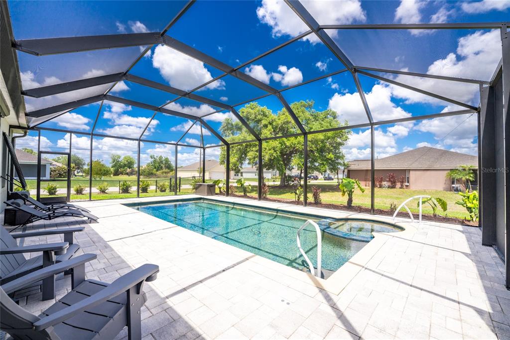 27366 Deep Creek Boulevard Punta Gorda, FL 33983 - Photo 49 of 63 a view of a swimming pool with a patio