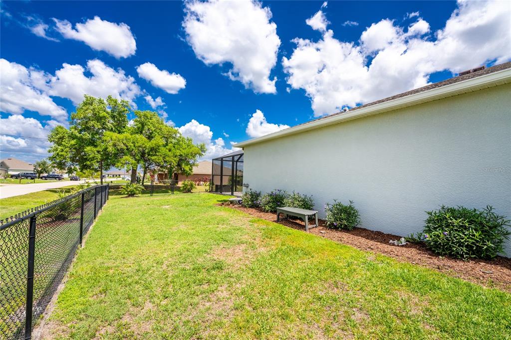 27366 Deep Creek Boulevard Punta Gorda, FL 33983 - Photo 55 of 63 a swimming pool with garden