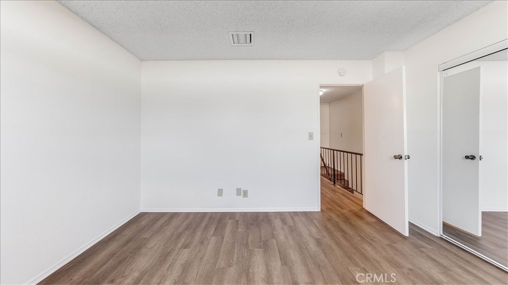 636 East Harvard Road, Unit C Burbank, CA 91501 - Photo 11 of 13 a view of a room with wooden floor