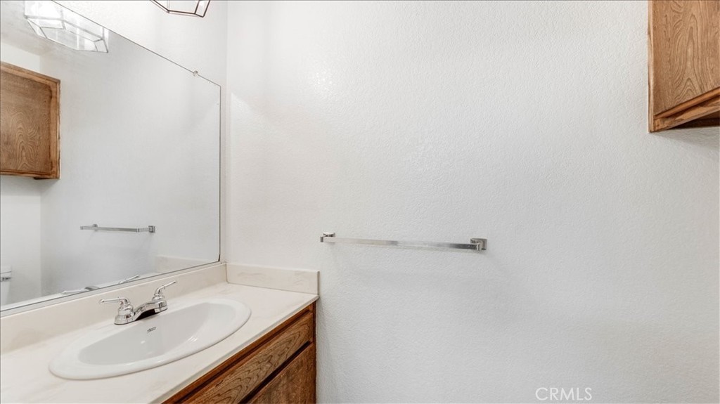 636 East Harvard Road, Unit C Burbank, CA 91501 - Photo 5 of 13 a bathroom with a sink and a mirror