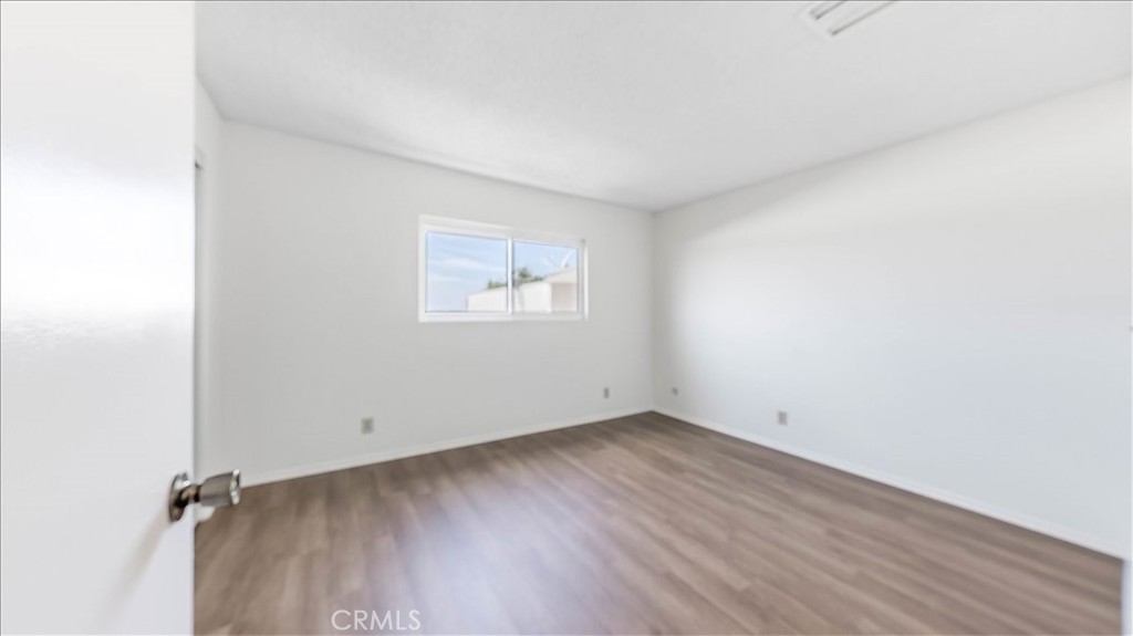 636 East Harvard Road, Unit C Burbank, CA 91501 - Photo 9 of 13 an empty room with a workspace
