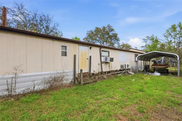 a view of a balcony with chairs