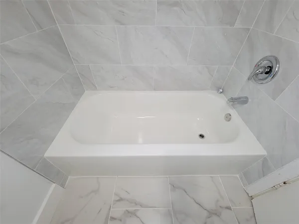 a bathroom with a bathtub