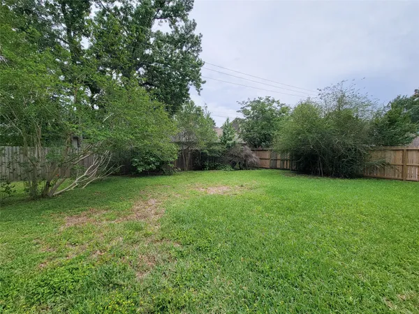 a view of a backyard with a garden