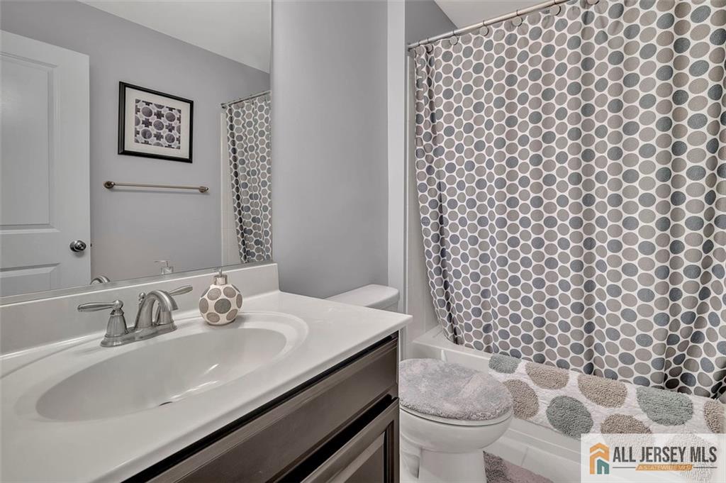 1501 Hights Farm Road South, Unit 1501 Monroe Township, NJ 08831 - Photo 22 of 30 a bathroom with a sink and a toilet