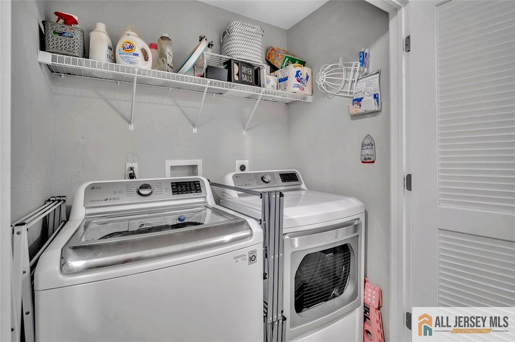 1501 Hights Farm Road South, Unit 1501 Monroe Township, NJ 08831 - Photo 28 of 30 a utility room with dryer and washer