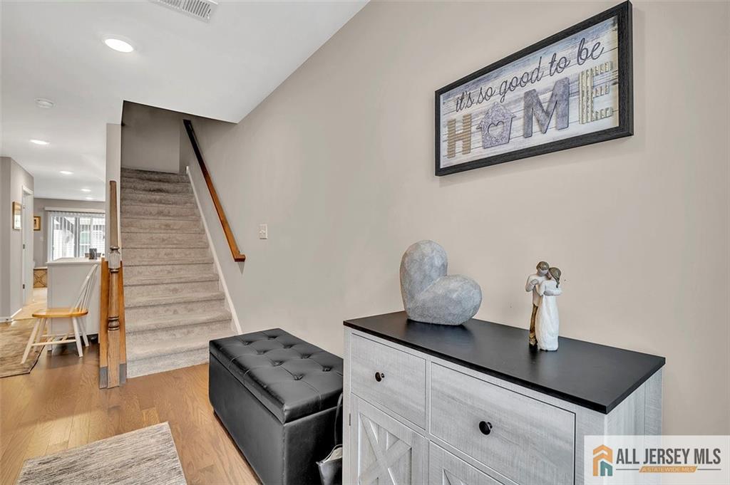1501 Hights Farm Road South, Unit 1501 Monroe Township, NJ 08831 - Photo 5 of 30 a kitchen with a refrigerator and a stove
