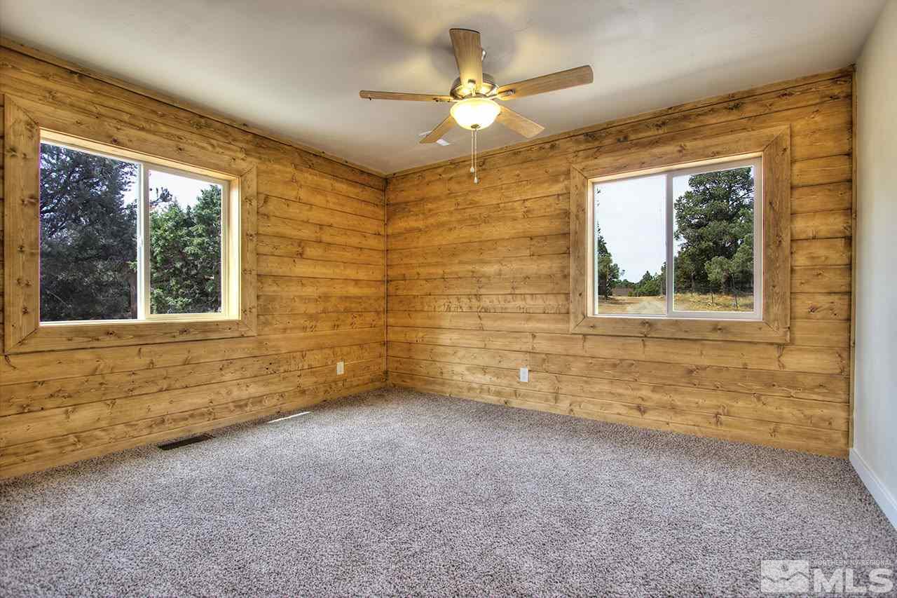 2240 Lousetown Road Reno, NV 89521 - Photo 14 of 25 a view of an empty room with a window