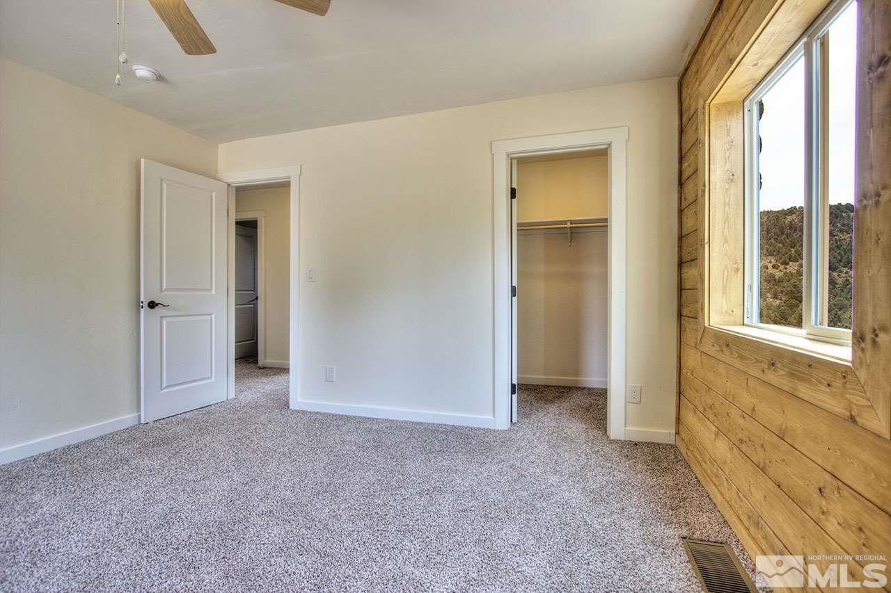2240 Lousetown Road Reno, NV 89521 - Photo 15 of 25 a view of an empty room with a window