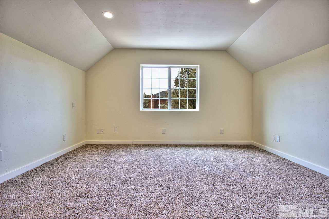 2240 Lousetown Road Reno, NV 89521 - Photo 19 of 25 an empty room with a window