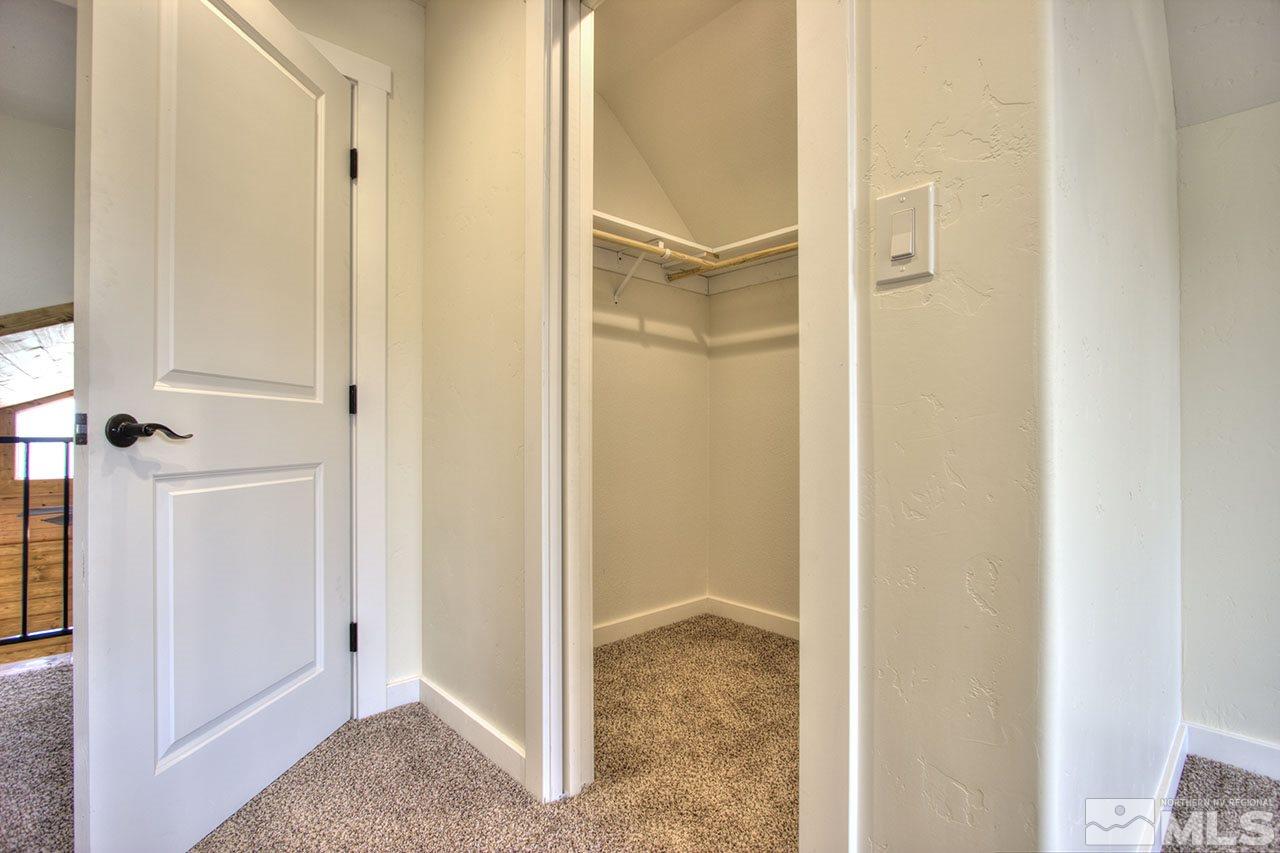 2240 Lousetown Road Reno, NV 89521 - Photo 22 of 25 a view of a bathroom with a glass door