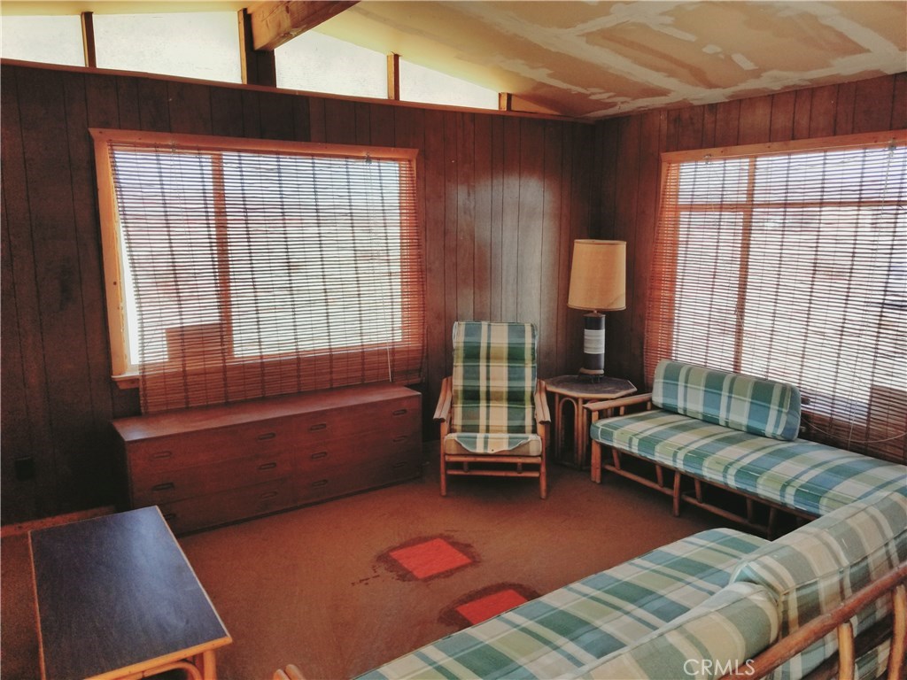 80649 Brown Road Twentynine Palms, CA 92277 - Photo 6 of 15 a living room with furniture and a window