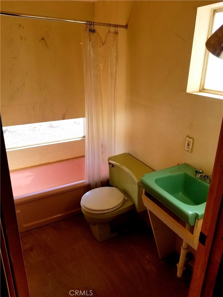 80649 Brown Road Twentynine Palms, CA 92277 - Photo 10 of 15 a bathroom with a sink and a toilet