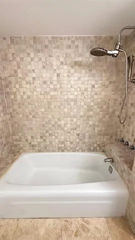 a bathroom with a bathtub