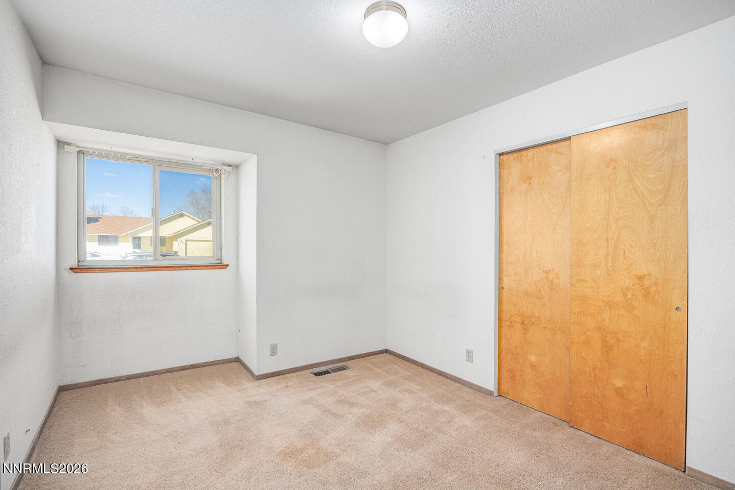 540 Michael Drive Fallon, NV 89406 - Photo 11 of 16 an empty room with windows