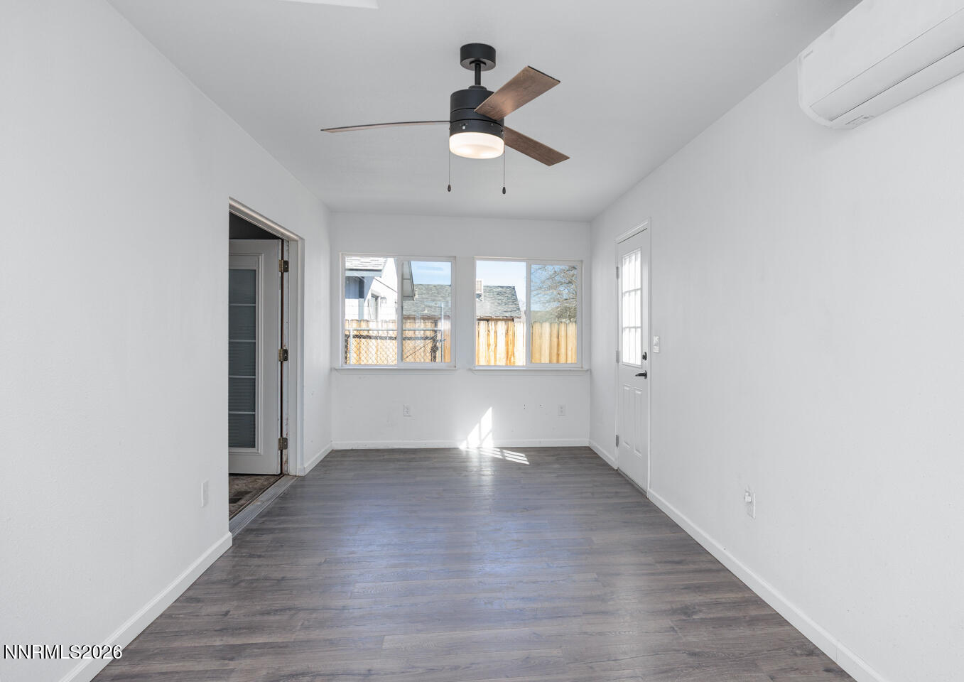 540 Michael Drive Fallon, NV 89406 - Photo 6 of 16 wooden floor in an empty room with a window