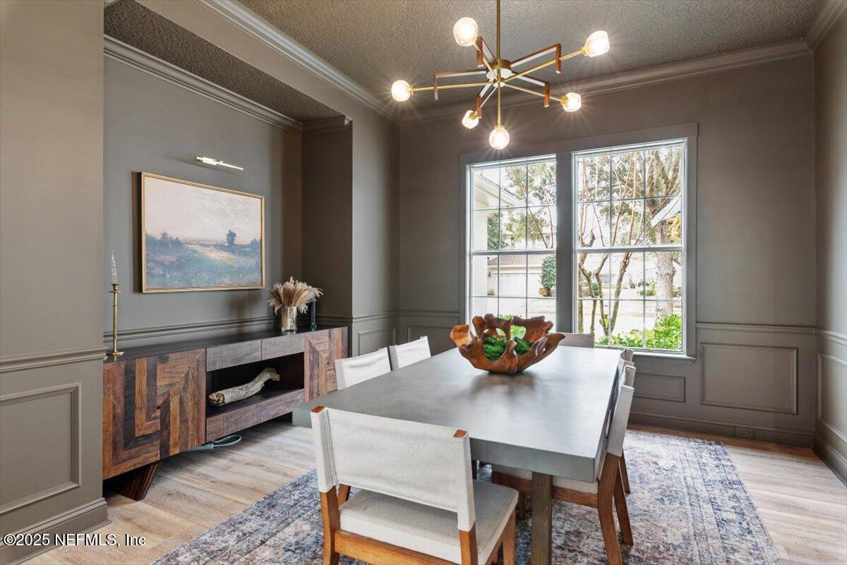 1047 Eagle Point Drive St. Augustine, FL 32092 - Photo 11 of 85 a view of a dining room with furniture window and outside view