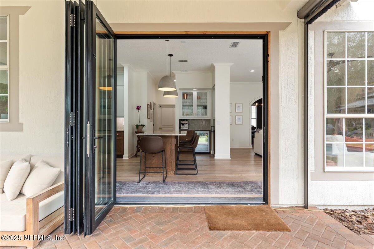 1047 Eagle Point Drive St. Augustine, FL 32092 - Photo 50 of 85 a view of a livingroom with furniture and front door