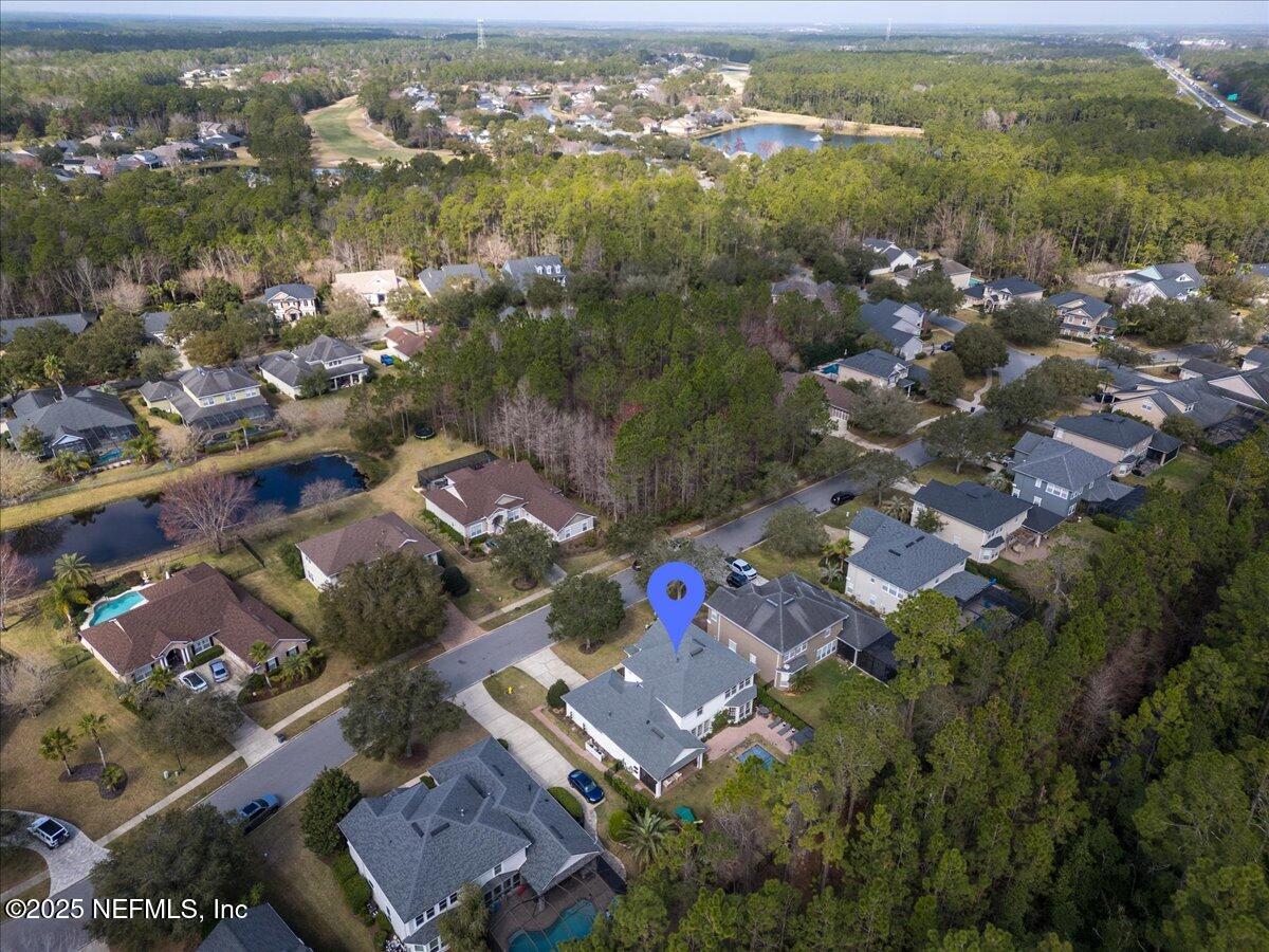 1047 Eagle Point Drive St. Augustine, FL 32092 - Photo 68 of 85 an aerial view of residential houses with outdoor space