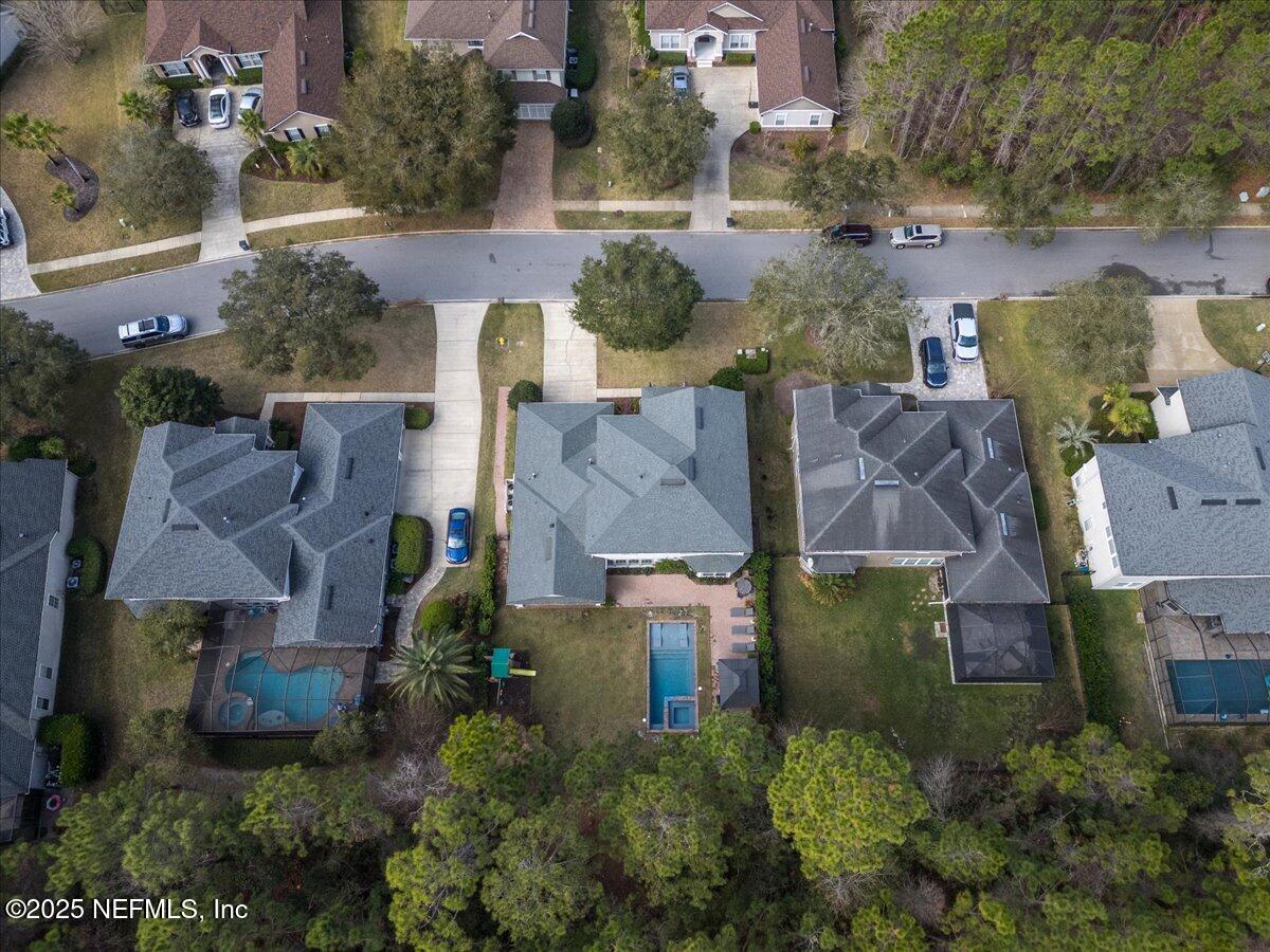 1047 Eagle Point Drive St. Augustine, FL 32092 - Photo 69 of 85 an aerial view of houses with outdoor space