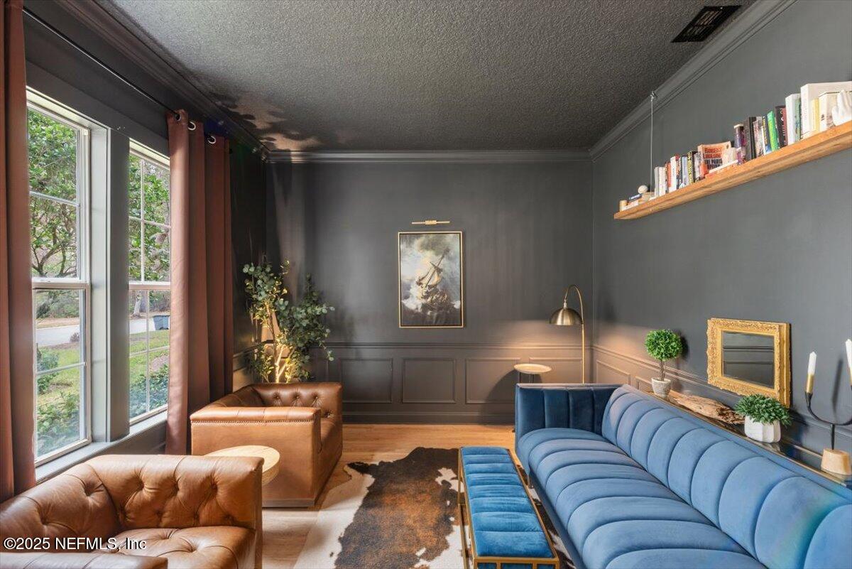 1047 Eagle Point Drive St. Augustine, FL 32092 - Photo 8 of 85 a living room with furniture and a window