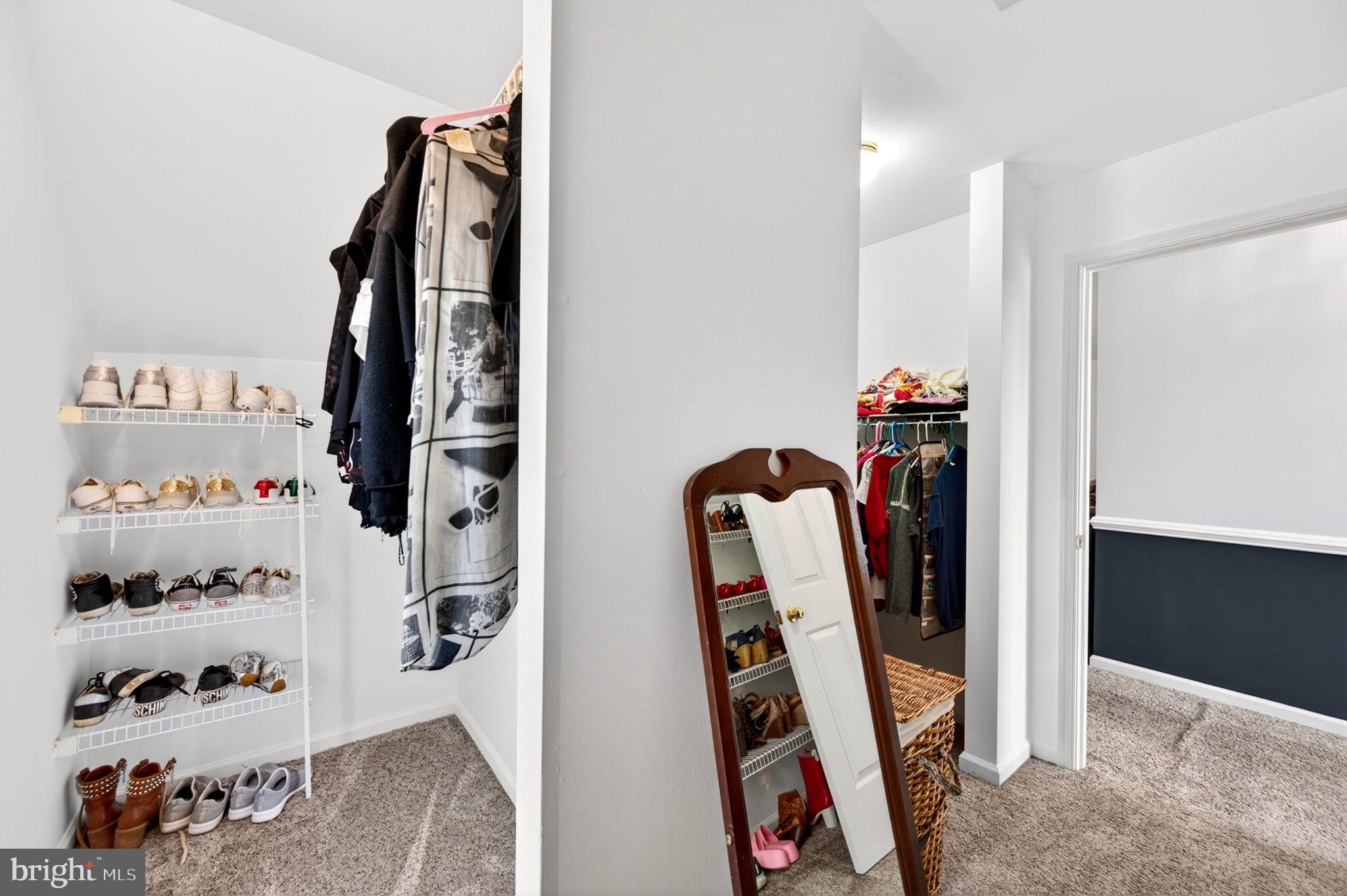 8 North Pointe Terrace Middletown, MD 21769 - Photo 35 of 74 a view of walk in closet with clothes and shoes