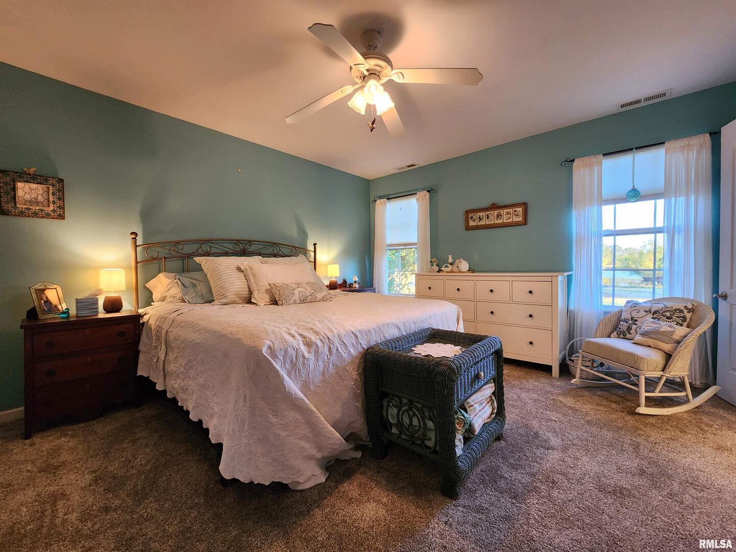 156 Hanover Lane Murphysboro, IL 62966 - Photo 25 of 63 a spacious bedroom with a bed and a chandelier