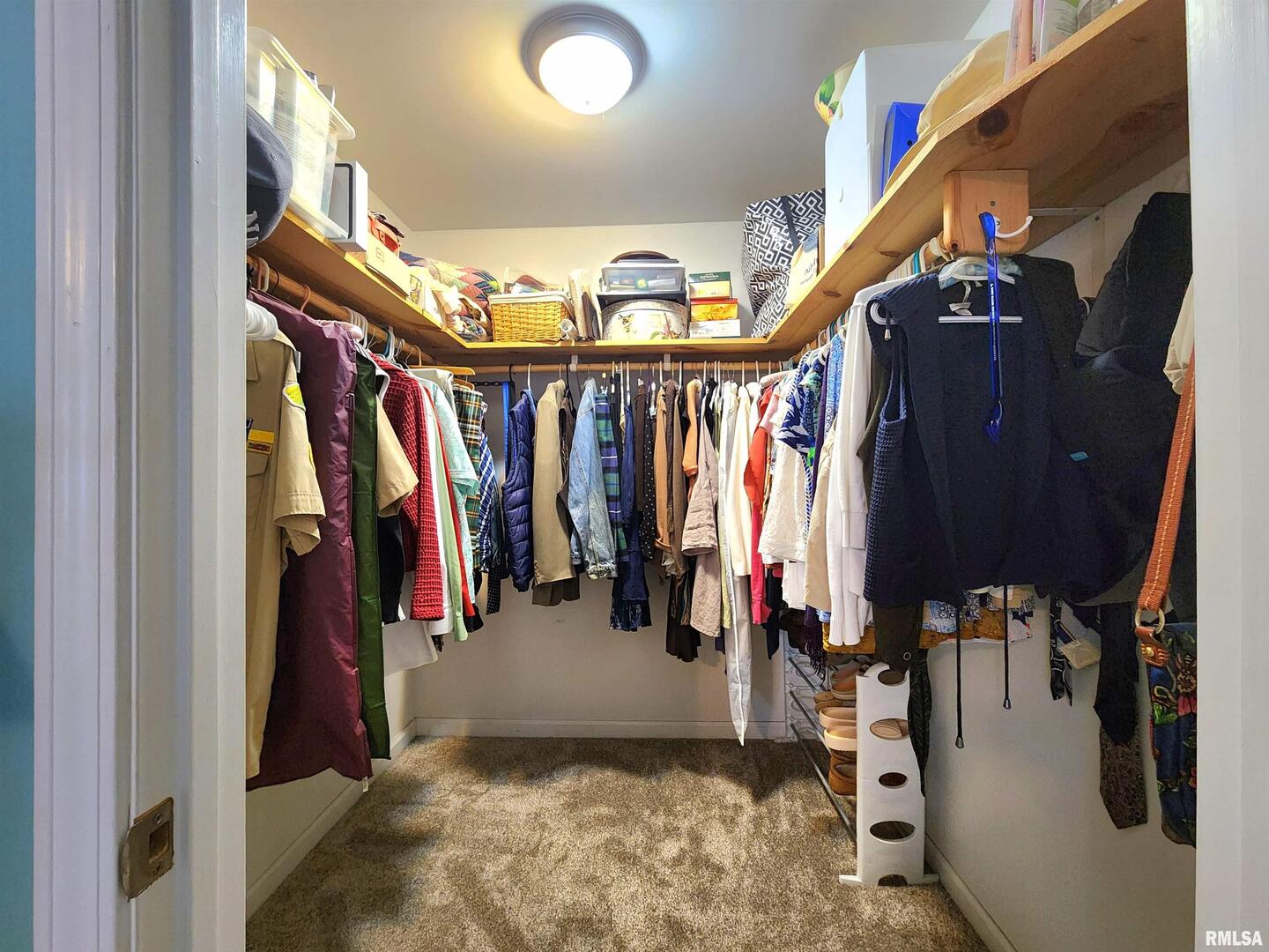 156 Hanover Lane Murphysboro, IL 62966 - Photo 27 of 63 a view of walk in closet with clothes and shoes