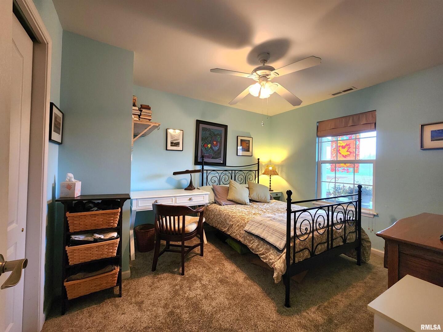 156 Hanover Lane Murphysboro, IL 62966 - Photo 35 of 63 a bedroom with a bed and a chandelier