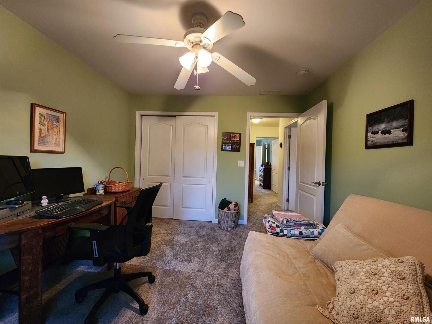 156 Hanover Lane Murphysboro, IL 62966 - Photo 38 of 63 a bedroom with a bed and a chandelier