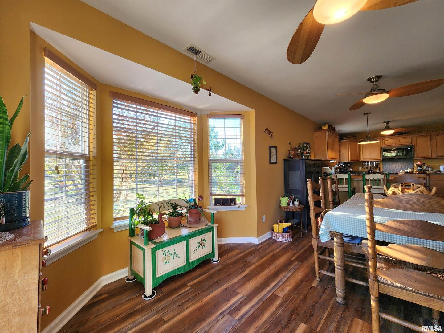 156 Hanover Lane Murphysboro, IL 62966 - Photo 10 of 63 a living room with furniture a flat screen tv and windows