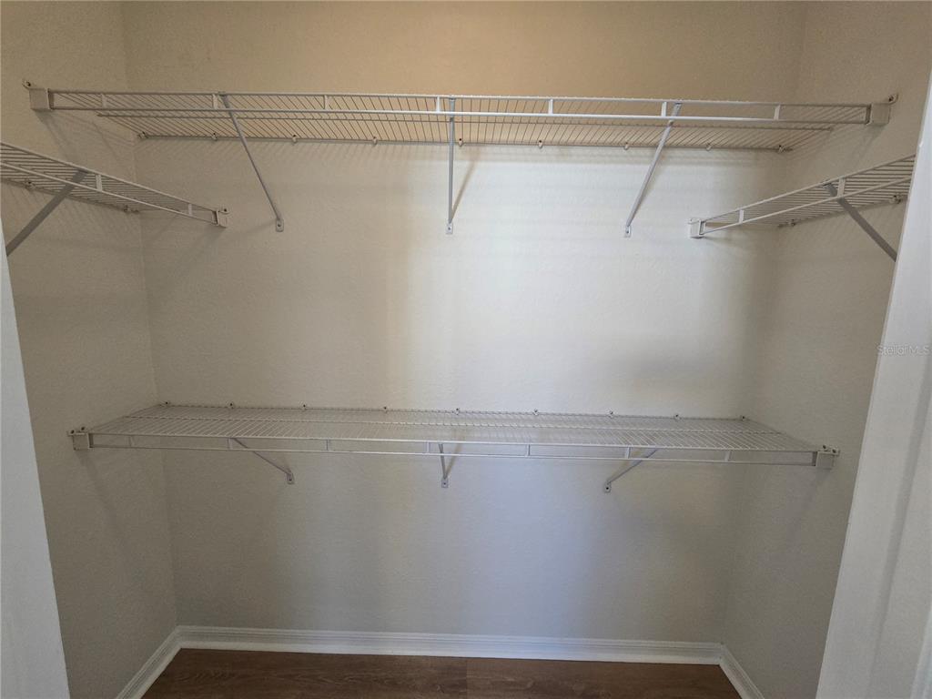 4221 West Spruce Street, Unit 2420 Tampa, FL 33607 - Photo 30 of 33 a view of a room with racks on the wall