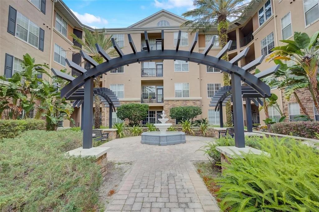 4221 West Spruce Street, Unit 2420 Tampa, FL 33607 - Photo 4 of 33 a view of a garden with plants