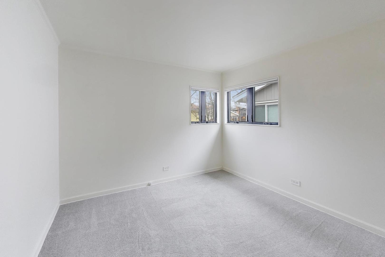 3530 Hillside Road Evanston, IL 60201 - Photo 12 of 27 a view of empty room with windows