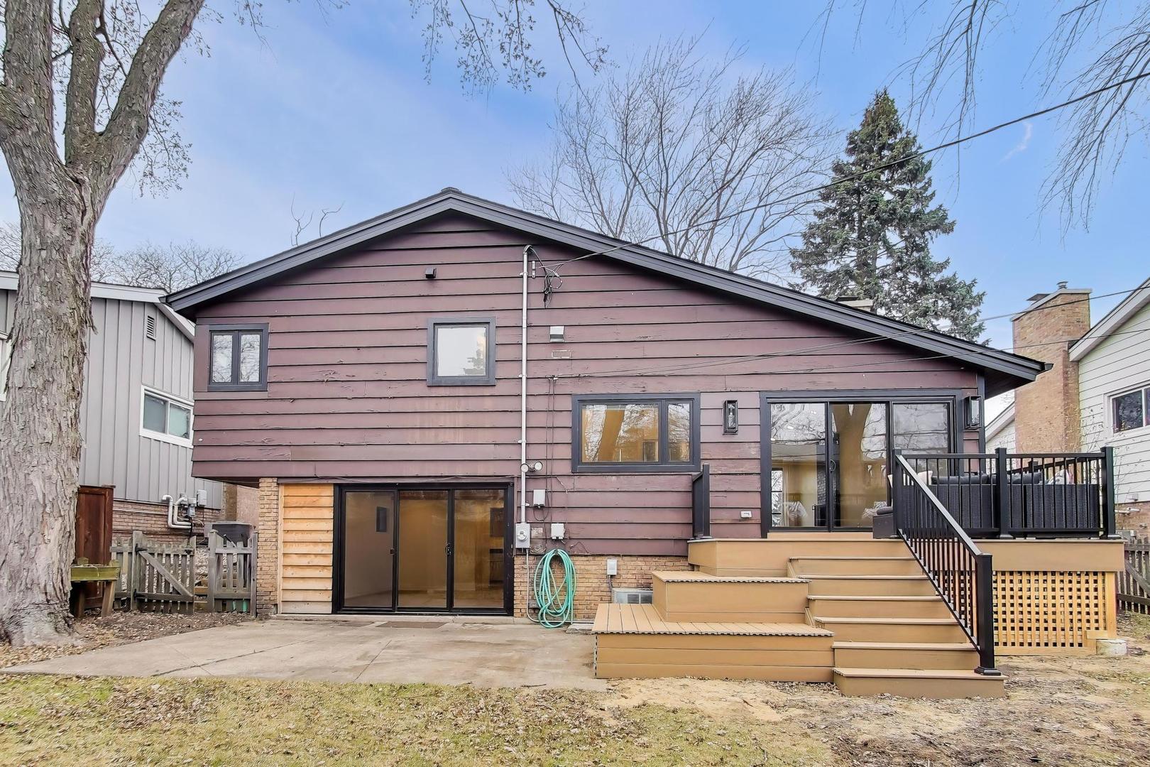 3530 Hillside Road Evanston, IL 60201 - Photo 21 of 27 a view of a house with a yard and sitting area